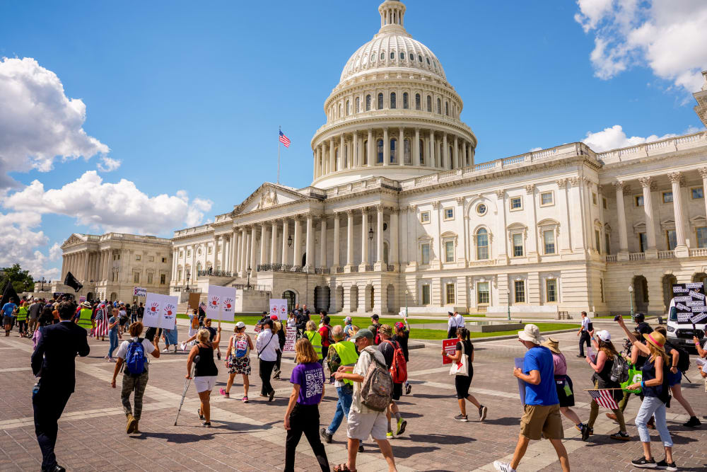 Image: Activists Stage Multiple Protests On Capitol Hill And Outside White House As Lawmakers Return From Summer Recess
