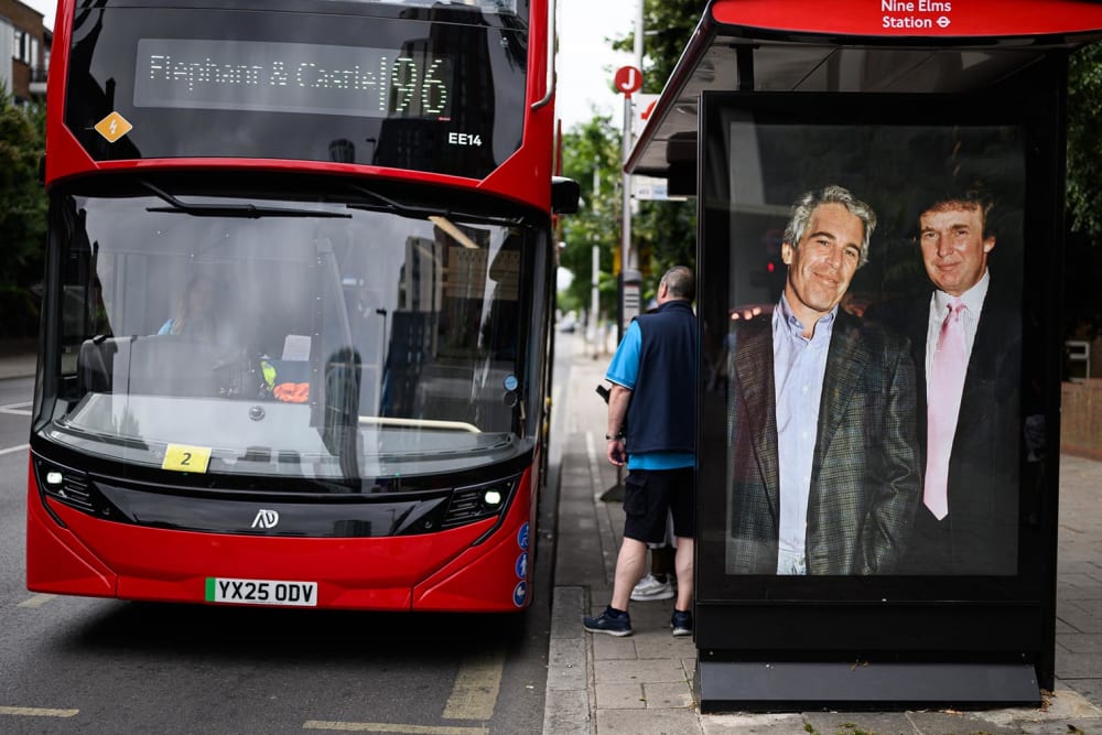 LONDON, ENGLAND - JULY 17: A photograph of President Donald Trump and Jeffrey Epstein is displayed on a bus shelter on July 17, 2025 in London.