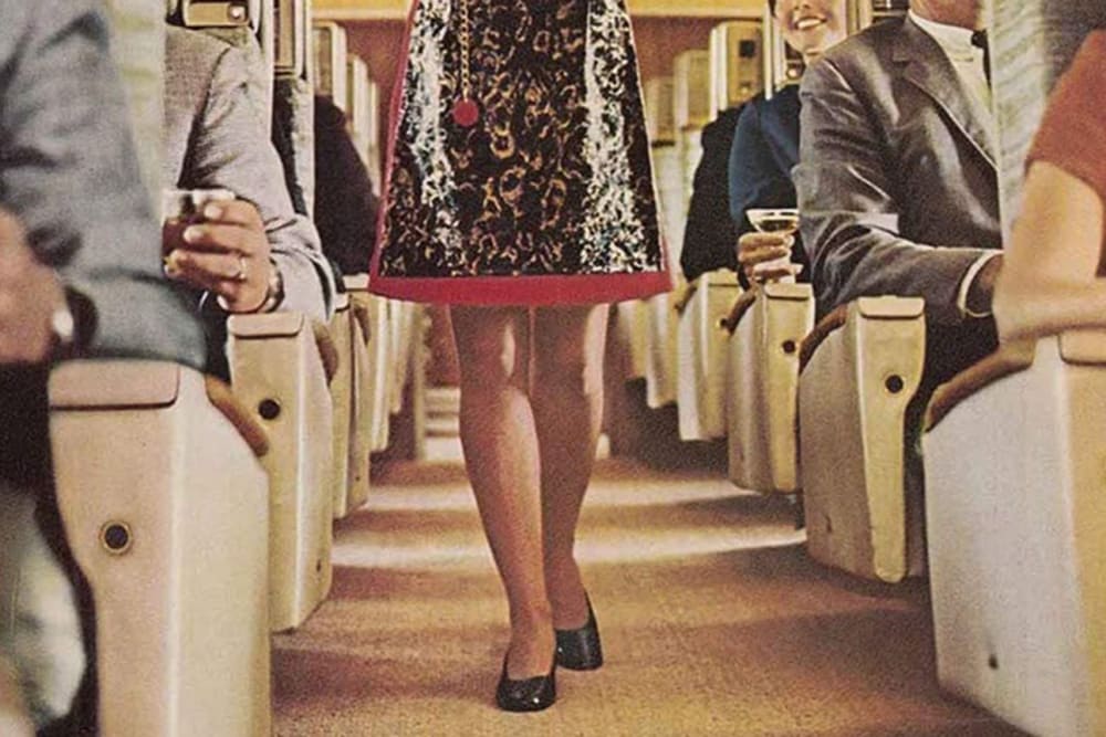 A clip from a Delta magazine ad with the caption "No floor show, just a working girl working."