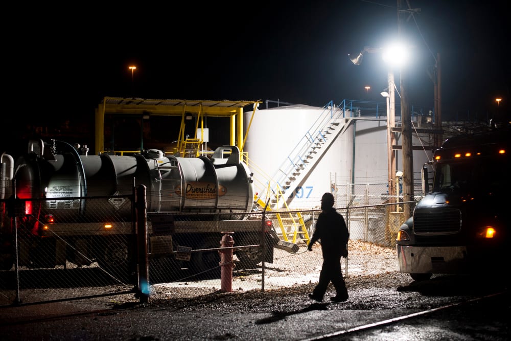 Emergency crews worked throughout the night cleaning up a chemical leak from a tank at the West Virginia American Water Plant on the Elk River, Jan. 11, 2014.