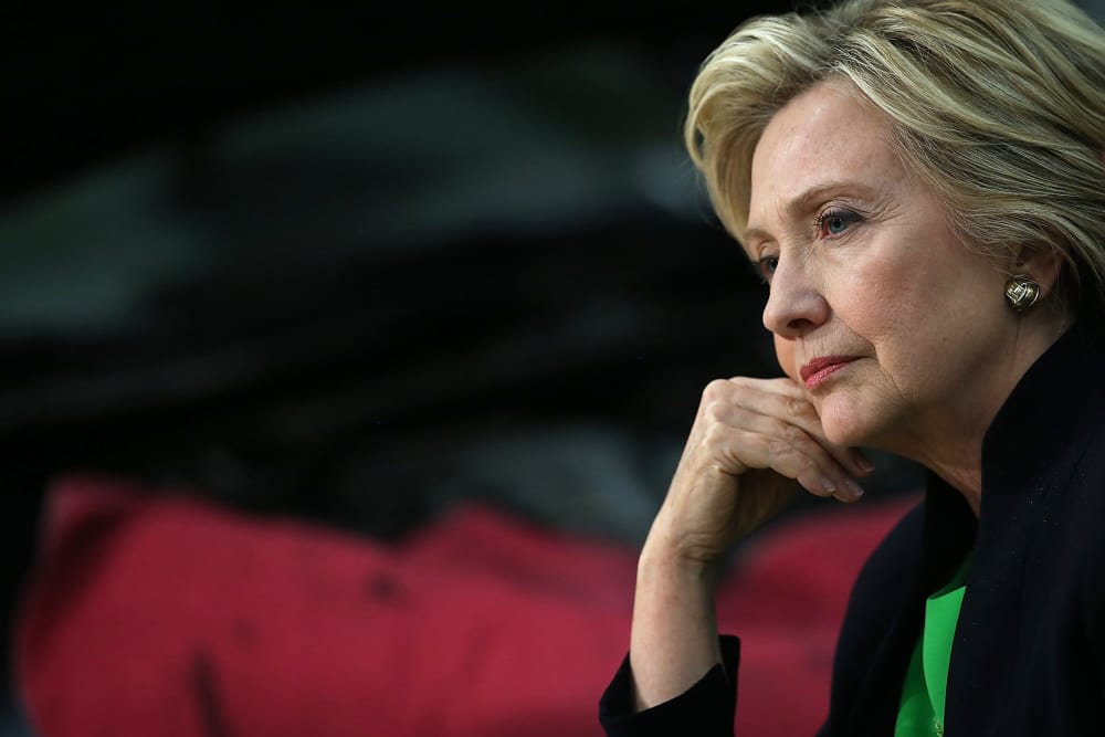 Democratic presidential hopeful and former Secretary of State Hillary Clinton looks on during a roundtable discussion with students and educators on April 14, 2015 in Monticello, Iowa. (Photo by Justin Sullivan/Getty)
