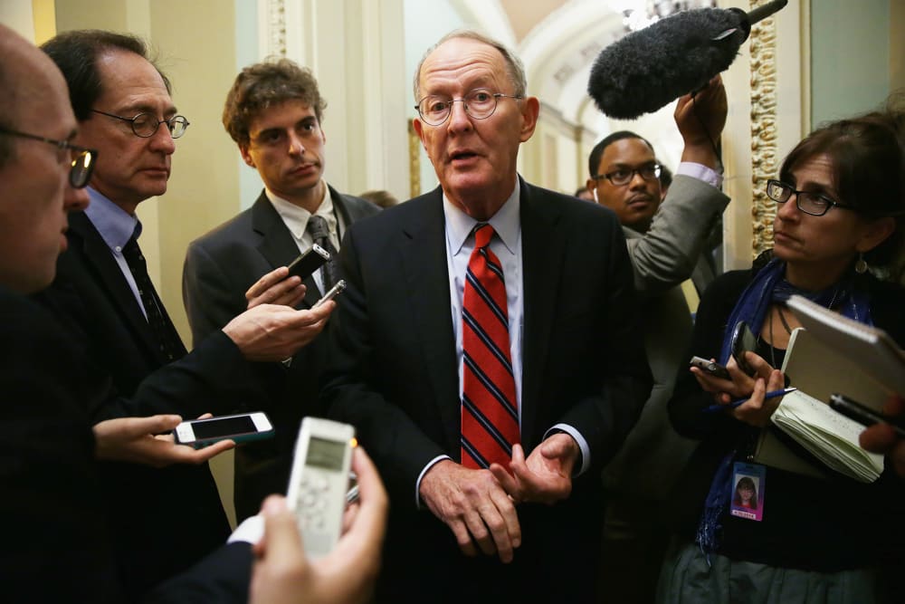 U.S. Sen. Lamar Alexander (R-TN) speaks to members of the media at the Capitol, Oct. 11, 2013.