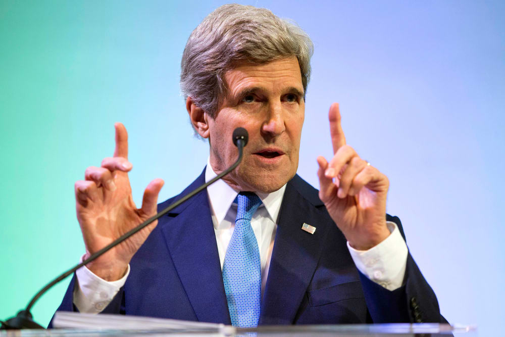 Secretary of State John Kerry gestures during a speech on climate change, Feb. 16, 2014.
