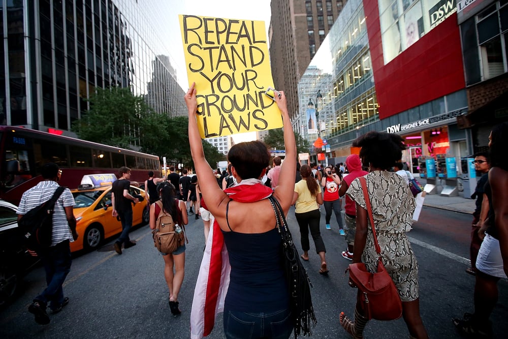 People march through the street after a rally for Trayvon Martin, July 14, 2013, in New York, N.Y.