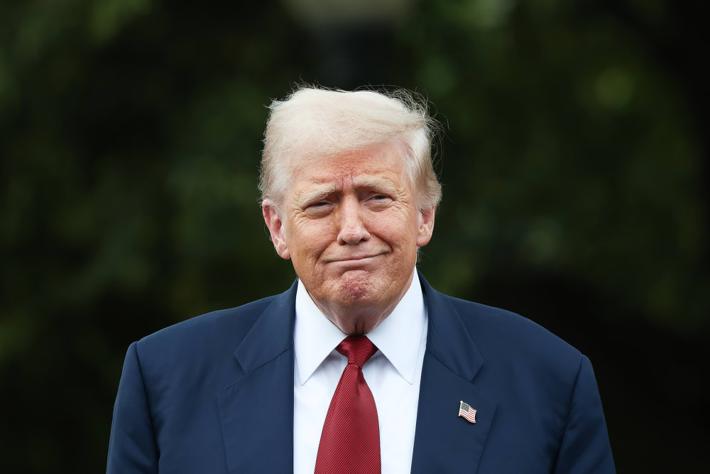 U.S. President Donald Trump smirking.