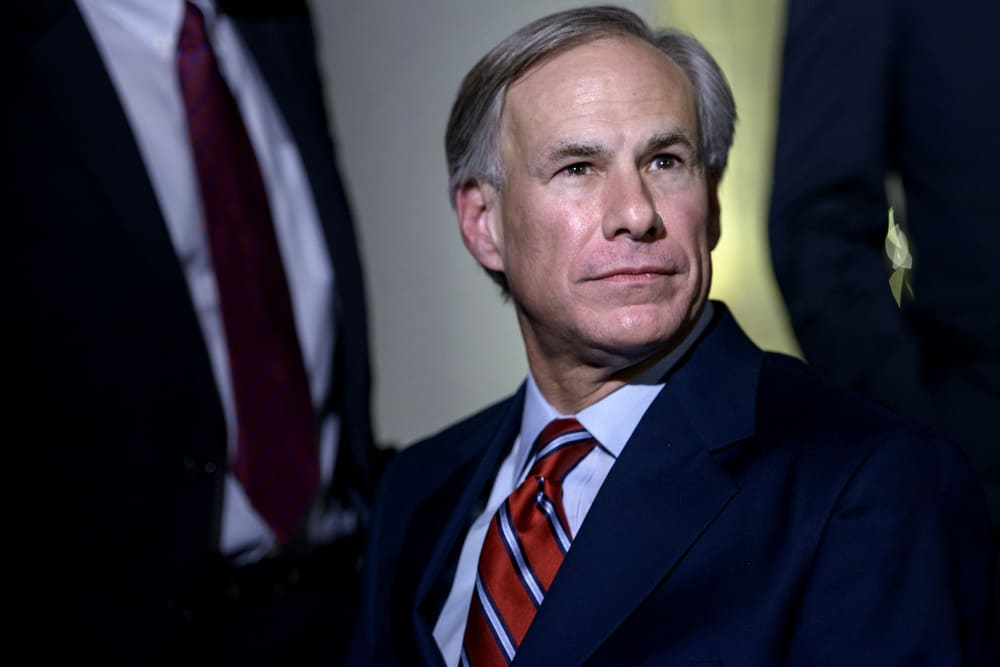 Texas Governor Greg Abbott (R-TX) listens to questions from the press after a meeting at the White House on Dec. 5, 2014 in Washington, DC.