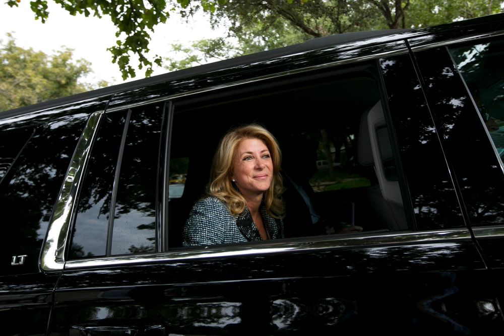 Democratic Texas gubernatorial candidate Wendy Davis leaves the Austin, Texas home of Jim Bryce where she gave a pep talk to campaign volunteers on Nov. 3, 2014.