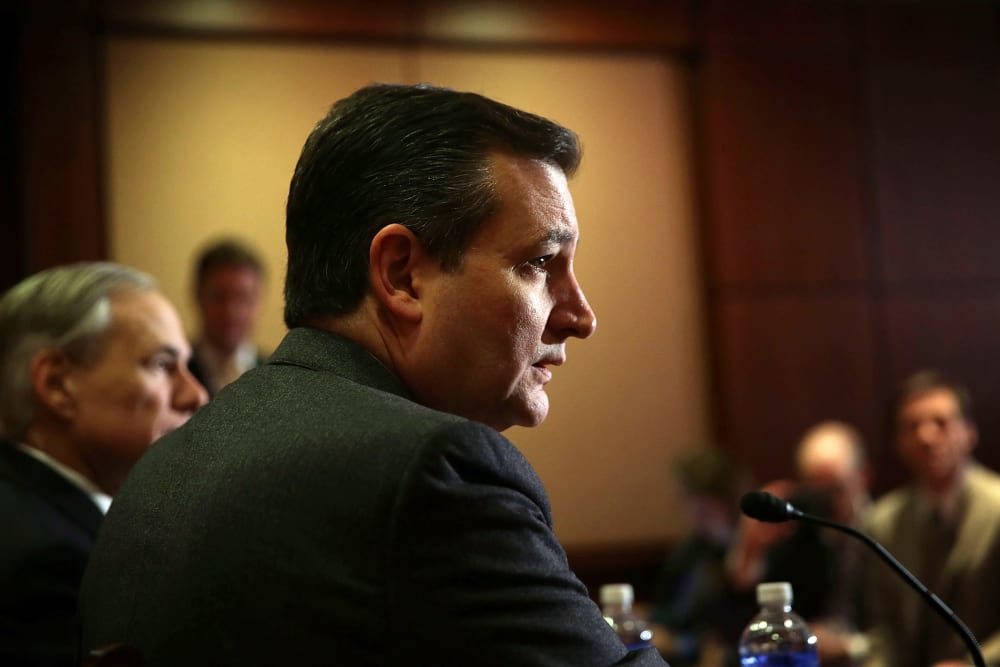 Republican presidential candidate Sen. Ted Cruz (R-Texas) (R) and Texas Governor Greg Abbott (L) participate in a news conference Dec. 8, 2015 on Capitol Hill in Washington, D.C. (Photo by Alex Wong/Getty)