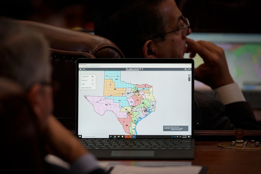 State representatives look at a congressional redistricting map in Austin, T.X.