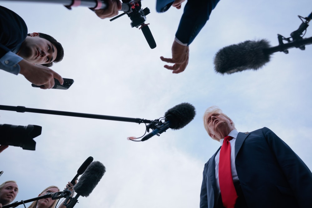President Donald Trump talks to reporters in Joint Base Andrews, M.D.
