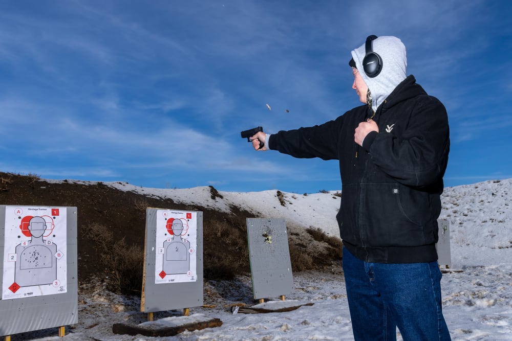 A person practices shooting at a concealed carry permit class in Rexburg, I.D.