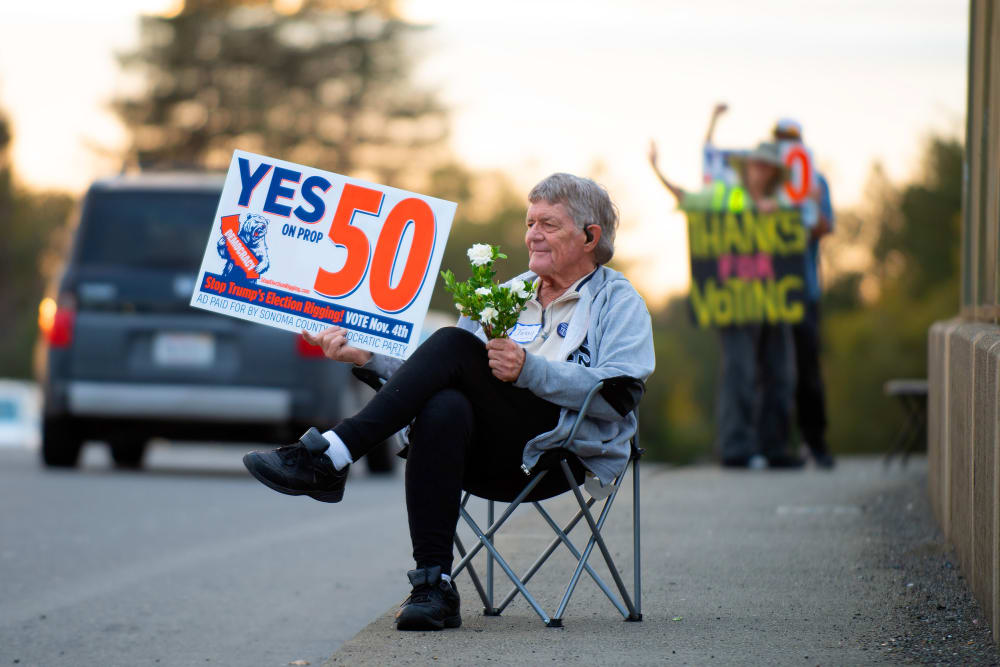 Jerry Canaday encourages passing motorists to vote Yes on Prop 50 in Santa Rosa, C.A.