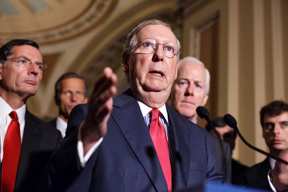 Senate Minority Leader Mitch McConnell speaks to reporters on Capitol Hill, Sept. 9, 2014. Photo by J. Scott Applewhite/AP.
