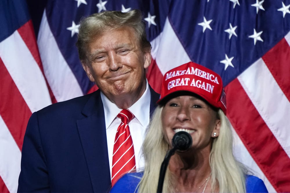Marjorie Taylor Greene speaks alongside Donald Trump at a campaign event in Rome, G.A.