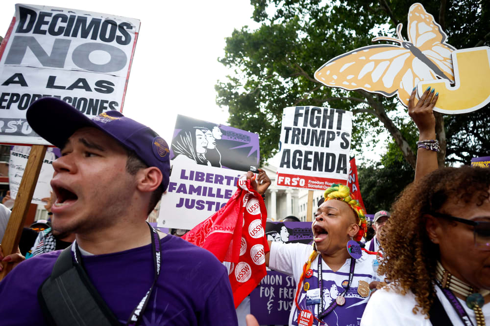 Demonstrators participate in the Justice Journey March in New Orleans to call for an end to the Trump administration’s ICE raids and the release of immigrant workers detained in Louisiana and across the United States.