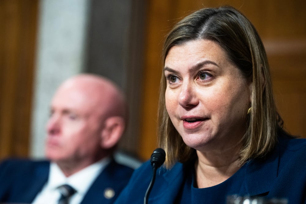 Sen. Elissa Slotkin, with Sen. Mark Kelly in the background.