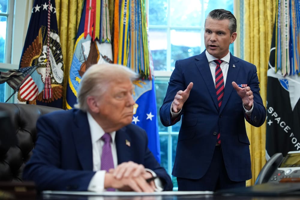 U.S. Defense Secretary Pete Hegseth and U.S. President Donald Trump in the Oval Office of the White House.