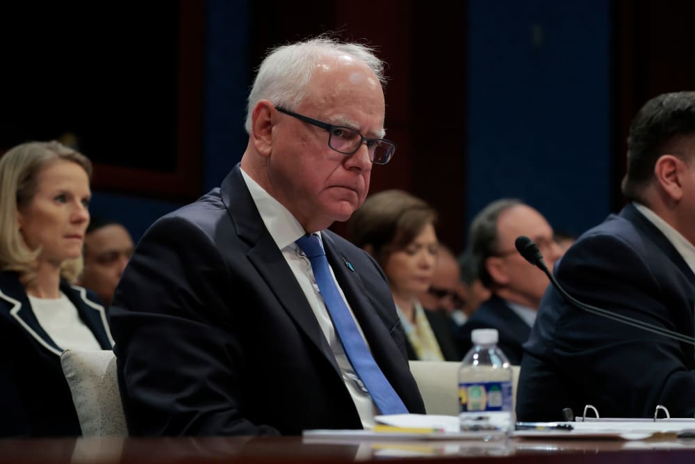 Tim Walz listens during a hearing with the House Oversight and Accountability Committee at the U.S. Capitol.