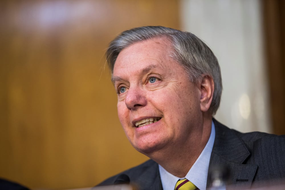 Senator Lindsey Graham questions U.S. Secretary of State John Kerry during a Senate Appropriations Subcommittee hearing in Washington, Feb. 24, 2016. (Photo by Samuel Corum/Anadolu Agency/Getty)