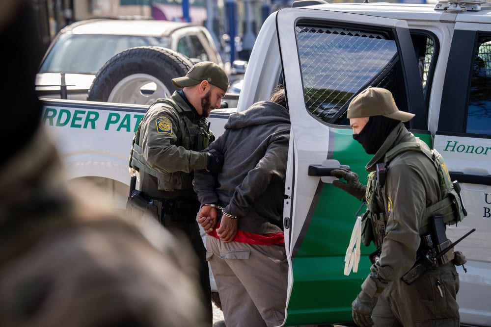 US Customs and Border Patrol agents detains a person in New Orleans, L.A.