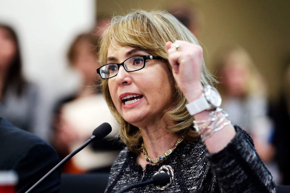 Gabrielle Giffords testifies before a Washington state House panel Tuesday, Jan. 28, 2014.