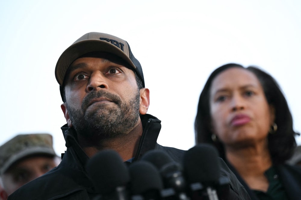 FBI Director Kash Patel, left, and District of Columbia mayor Muriel Bowser attend a press conference after a shooting in downtown Washington D.C., on Nov. 26, 2025.