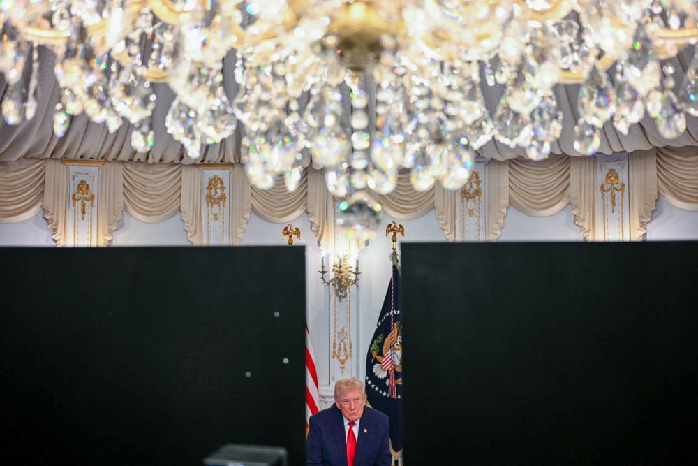 President Donald Trump participates in a video call with military service members from his Mar-a-Lago residence in Palm Beach, Florida, on Nov.27, 2025.