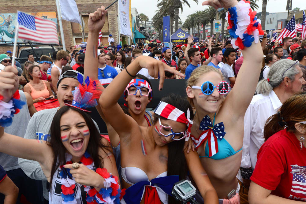 US fans gather to watch on a big screen at Hermosa Beach, California on June 26, 2014.