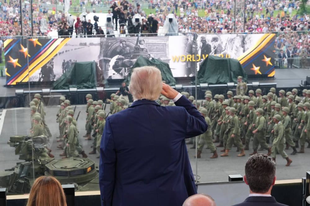 President Donald Trump salutes Army troops on the National Mall.