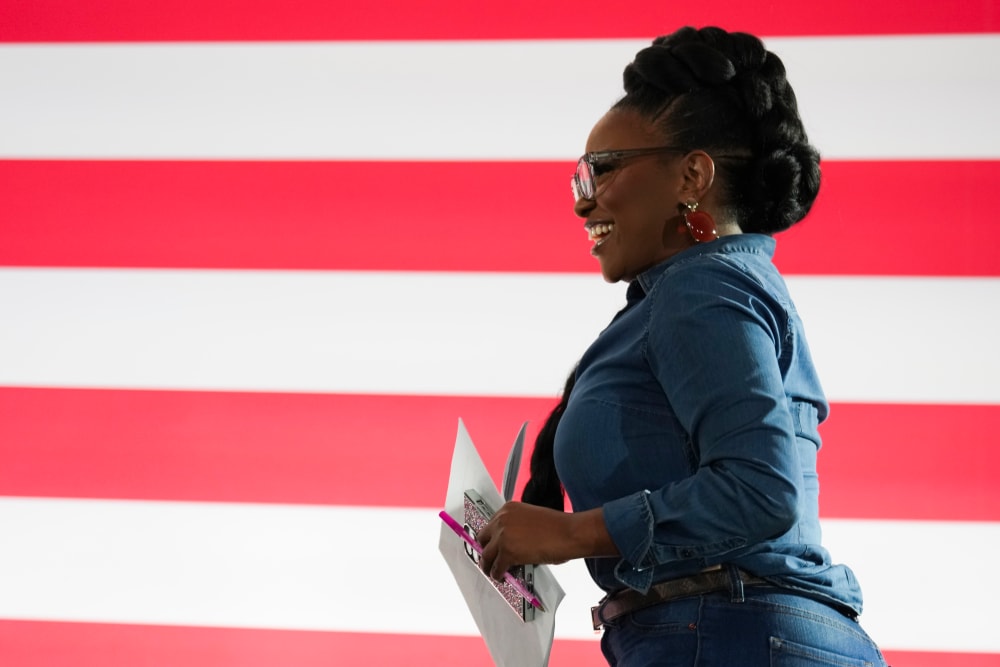 Texas Congresswoman Jasmine Crockett takes the stage during a rally featuring California Governor Gavin Newsom