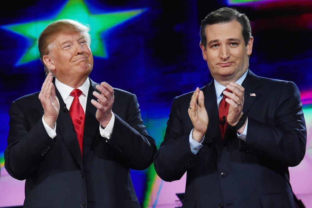 Republican presidential candidates Donald Trump and Sen. Ted Cruz applaud as they are introduced during the CNN presidential debate at The Venetian Las Vegas on Dec. 15, 2015 in Las Vegas, Nev. (Photo by Ethan Miller/Getty)