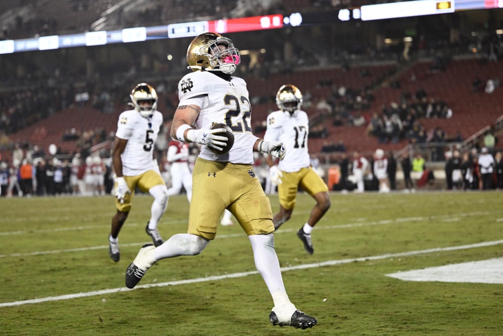 Aneyas Williams of the Notre Dame Fighting Irish runs the ball for a touchdown against the Stanford Cardinal.