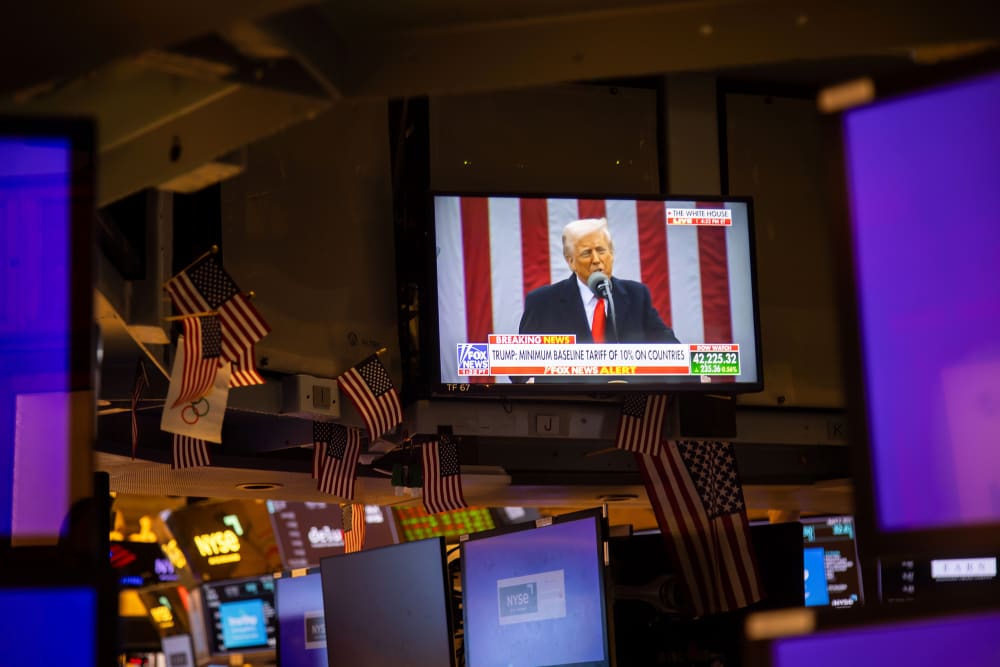 A television on the floor of the New York Stock Exchange in New York City on April 2, 2025, shows President Donald Trump speaking during a Rose Garden event.
