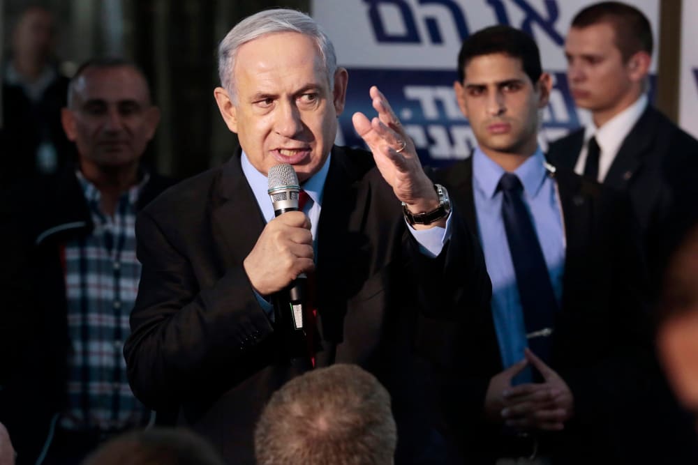 Israeli Prime Minister Benjamin Netanyahu speaking to his Likud party faithful in a campaign stop in Netanya, north of Tel Aviv, Israel on March 11, 2015. (Photo by Jim Hollander/EPA)