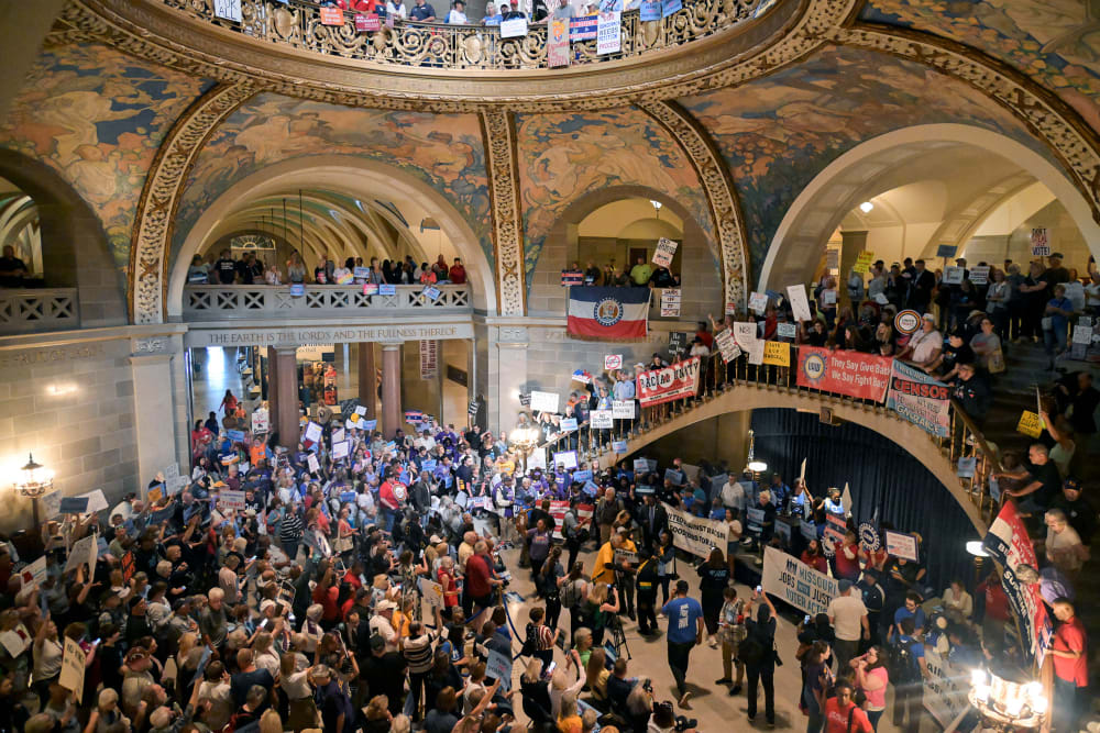Protestors demonstrate inside the rotunda of the Missouri Capitol Building in Jefferson City, M.O.