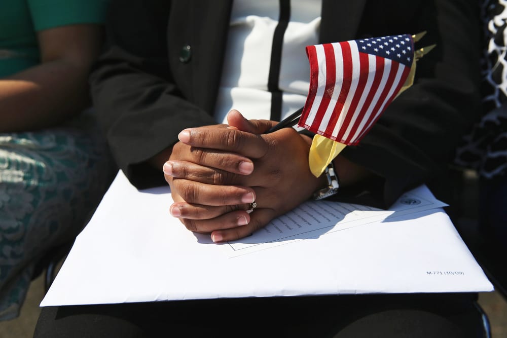 Immigrants prepare to become U.S. citizens at a naturalization ceremony at Liberty State Park on September 19, 2014 in Jersey City, New Jersey.