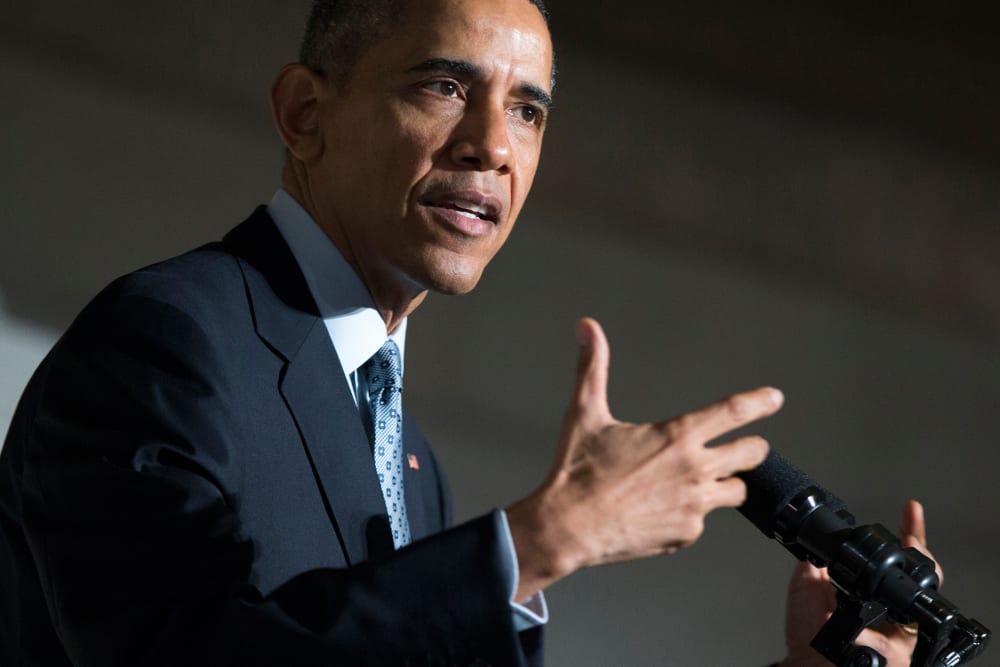 President Barack Obama speaks during a naturalization ceremony at the National Archives in Washington on Dec. 15, 2015. (Photo by Evan Vucci/AP)
