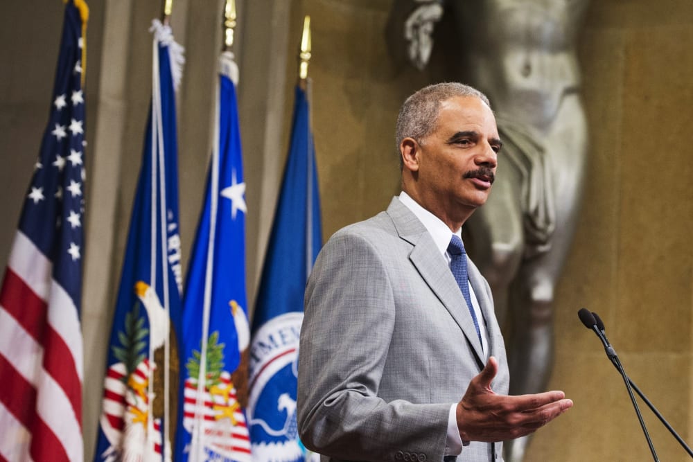 US Attorney General Eric Holder speaks during a Naturalization Ceremony at the Justice Department in Washington, DC, July 22, 2014.