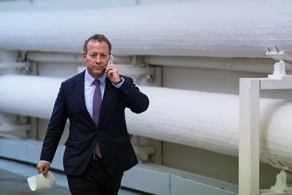 Representative Josh Gottheimer talks on his phone before a meeting on Capitol Hill in on Dec. 6, 2022.