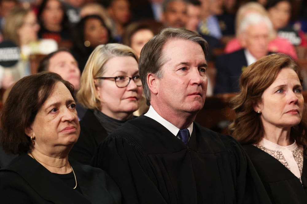 Supreme Court Justice Elena Kagan, Chief Justice John Roberts and Justice Amy Coney Barrett at the U.S. Capitol.
