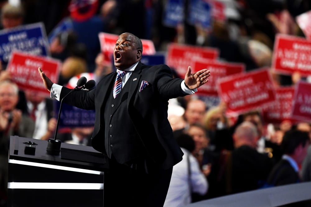 Pastor Mark Burns gestures as he delivers a speech at the Republican National Convention in Cleveland, O.H., on July 21, 2016.