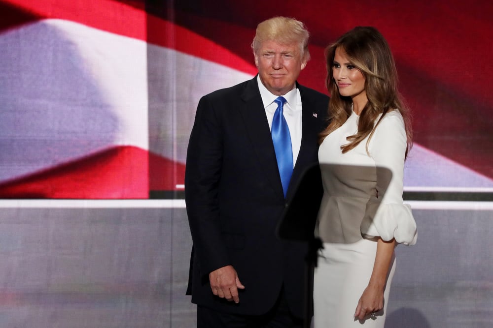Donald Trump stands with his wife Melania after she delivered a speech on the first day of the Republican National Convention on July 18, 2016 at the Quicken Loans Arena in Cleveland, Ohio. (Photo by Alex Wong/Getty)
