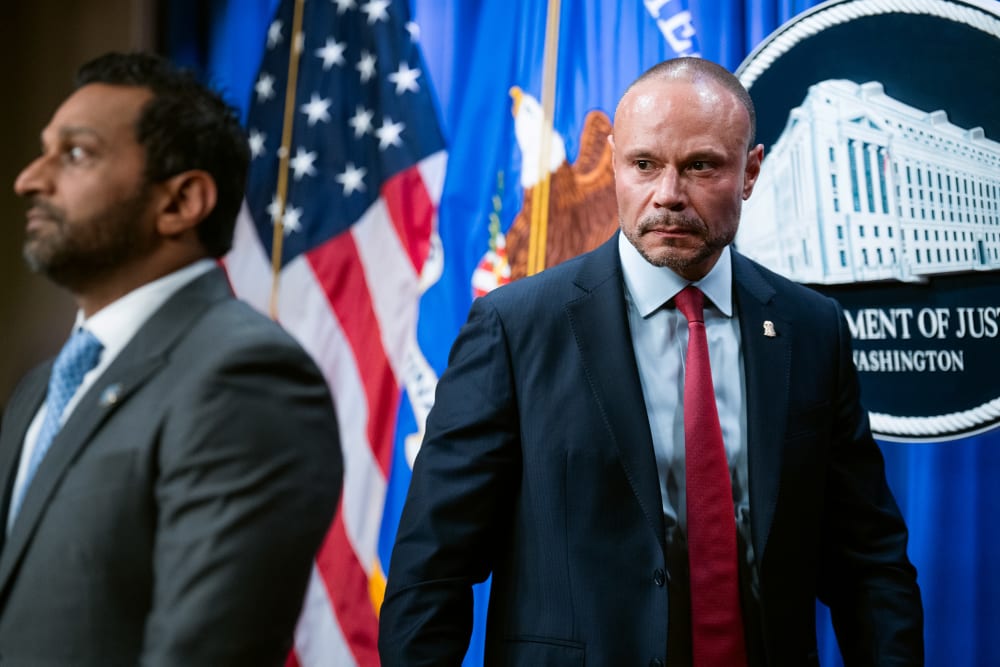 FBI Director Kash Patel, left, and Deputy Director of the FBI Dan Bongino conduct a news conference at the Department of Justice.