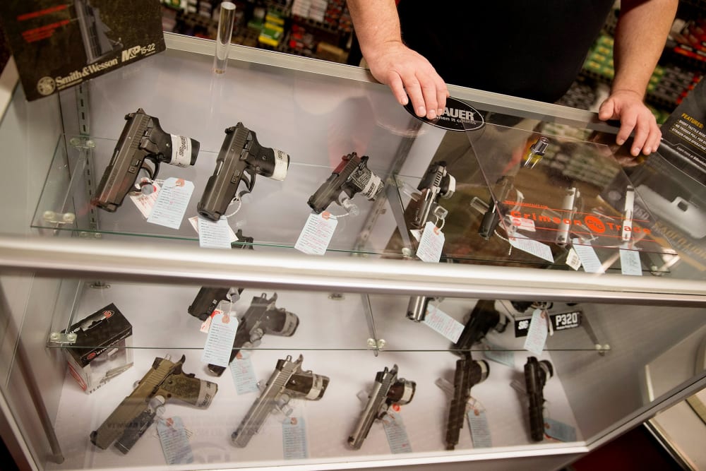 Customers shop for a handgun at Metro Shooting Supplies on Nov. 12, 2014 in Bridgeton, Mo. (Photo by Scott Olson/Getty)