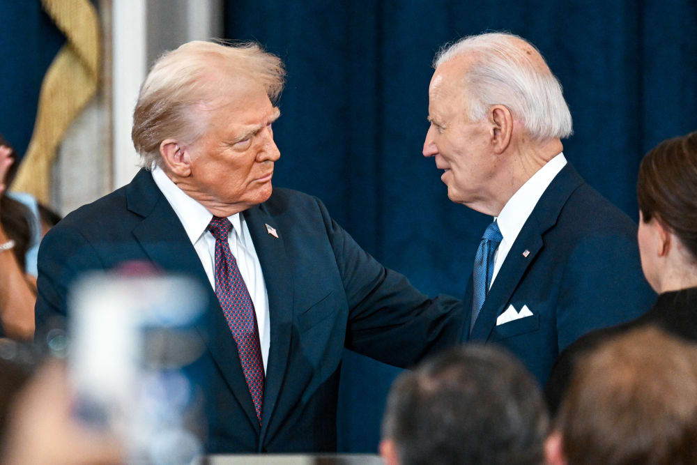 Donald Trump shakes hands with Joe Biden at Trump's inauguration on Jan. 20, 2025 in the U.S. Capitol Rotunda.