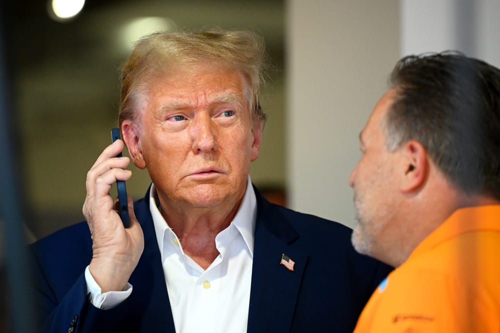 Donald Trump talks on the phone.