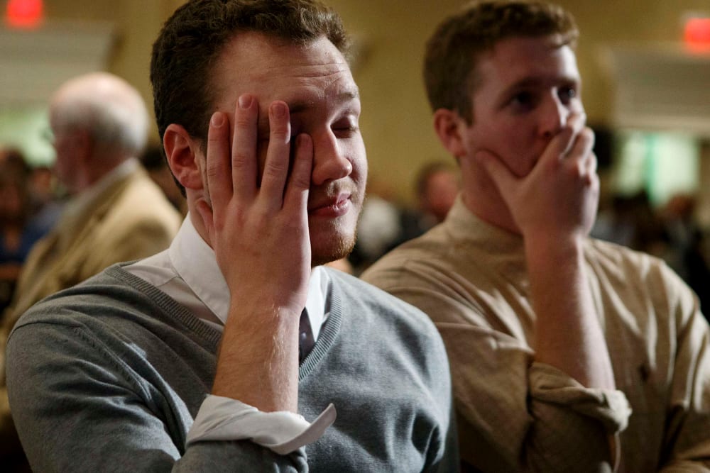 A supporter of Former Florida Governor and Democratic gubernatorial candidate Charlie Crist reacts to the midterm election being called in favor of Republican Florida Governor Rick Scott in St. Petersburg, Fla. on Nov. 4, 2014.