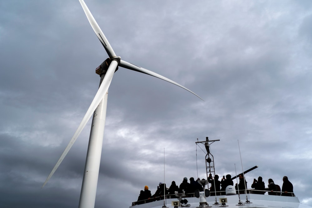 Guests tour one of the turbines of the United States&rsquo; first offshore wind farms off the coast of Block Island, R.I., on Oct. 17, 2022.