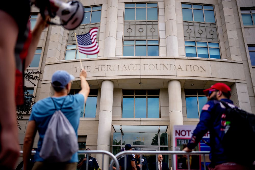 Protesters rally outside the Heritage Foundation building in Washington, D.C.