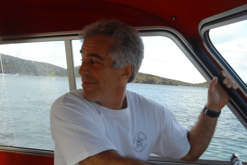 Jeffrey Epstein looking back on a boat.